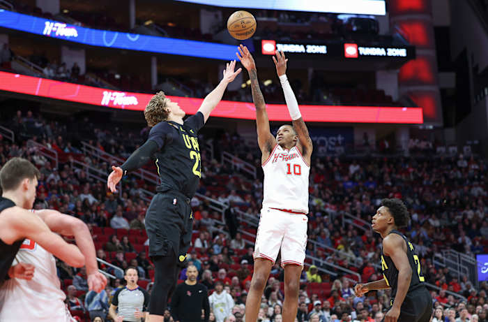 Rockets forward Jabari Smith Jr. shoots the ball over Utah Jazz forward Lauri Markkanen (23) during overtime at Toyota Center.